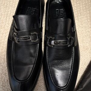 Salvatore Ferragamo Men's Black Leather Slip-Ons with Silver Accent